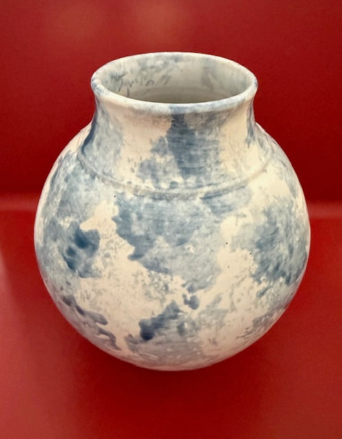 White and Blue Vessel